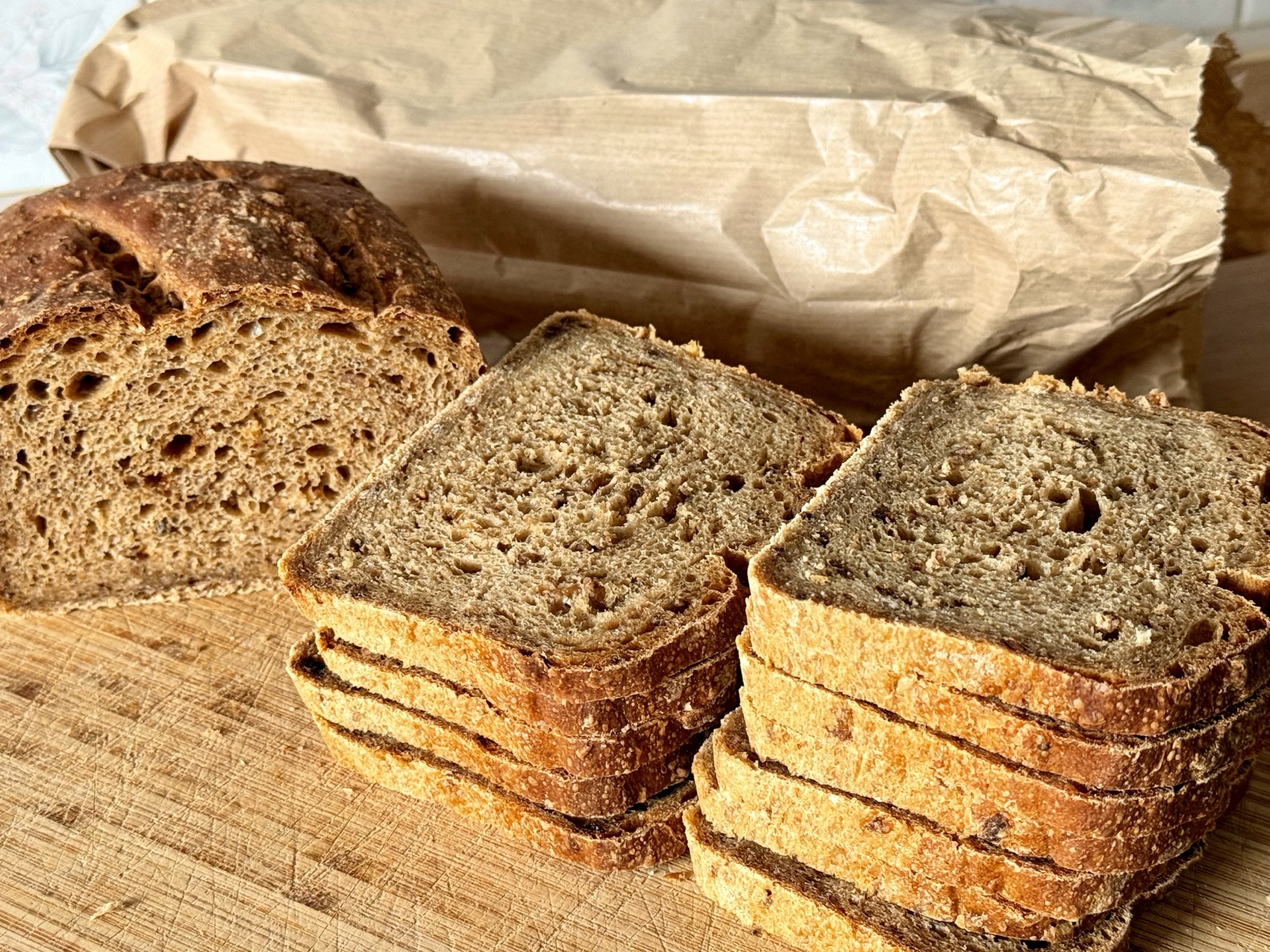 Two homemade loaves cooling, worth pennies in ingredients